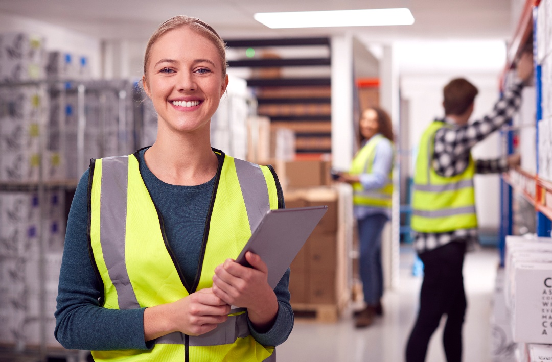 portrait-of-female-worker-inside-busy-warehouse-ch-2022-03-17-15-07-10-utc-1 portrait-of-female-worker-inside-busy-warehouse-ch-2022-03-17-15-07-10-utc-1