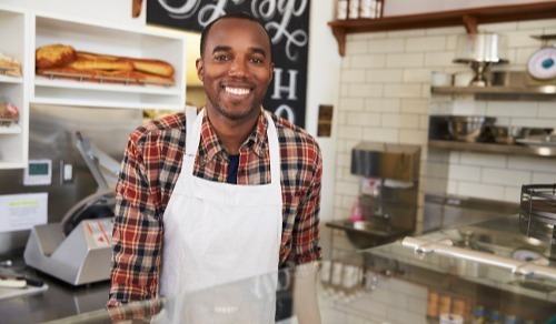 business-owner-behind-the-counter-at-a-sandwich-ba-2021-08-26-16-13-07-utc-1-1 business-owner-behind-the-counter-at-a-sandwich-ba-2021-08-26-16-13-07-utc-1-1
